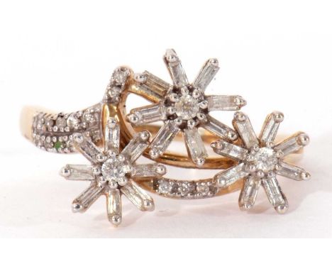 Modern 9ct gold and diamond ring, an unusual design with three rotating flower heads set with small round cut and baguette di