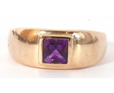 Modern 9ct gold and amethyst ring, the square cut amethyst bezel set and raised upon a plain polished mount, size V/W, g/w 5.