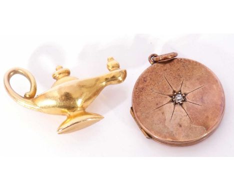 Mixed Lot: 9ct gold magic lantern charm, 1.4gms, together with a small round hinged locket, 20mm diam, the centre with an old