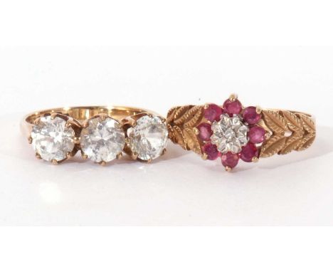 Mixed Lot: 9ct gold, ruby and diamond cluster ring, flower head design centring a small diamond in an illusion setting, raise