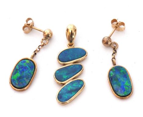 Mixed Lot: pair of modern opal earrings of oval shape, 13 x 8mm, framed and enclosed in 375 stamped mounts, suspended from ch