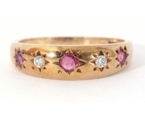 Vintage 9ct gold ruby and diamond set ring alternate set with three small round cut rubies and two small diamonds, each indiv