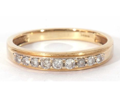 Modern 9ct gold and diamond half hoop ring, the top section set with nine small graduated single cut diamonds, 0.20ct approx,
