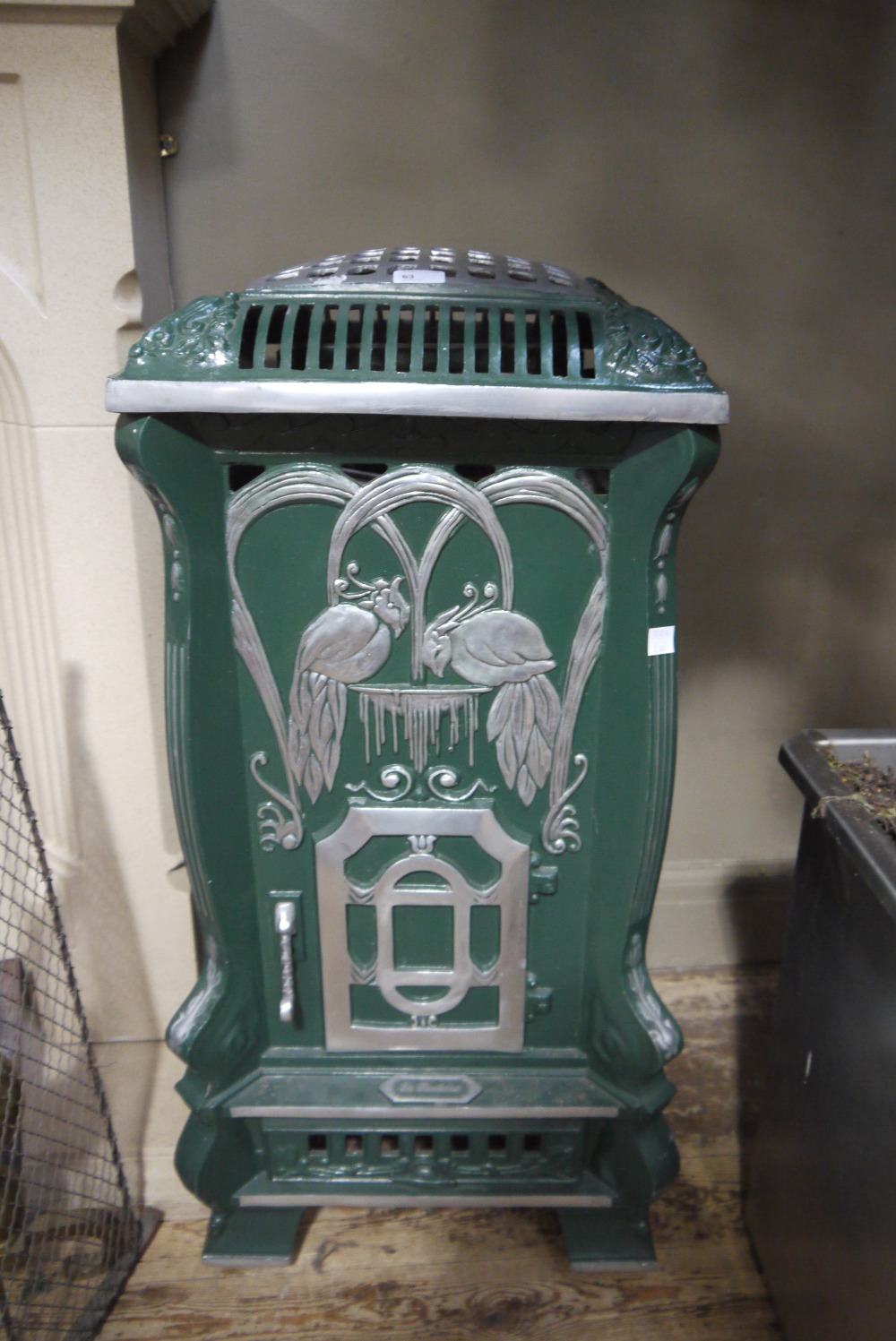 A 'La Fontaine' cast metal LPG gas room heater, decorated in relief