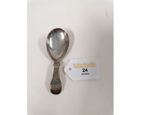 A silver hallmarked caddy spoon with EM maker's mark to the handle 