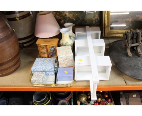 A tray of decorative items, to include a jewellery box, a pair of floral decorated vases, and a white coloured shelf rack