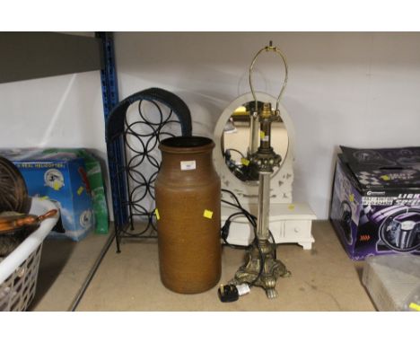 A wicker bottle rack, a gilt coloured table lamp base, a white painted dressing table mirror, and a brown West German vase