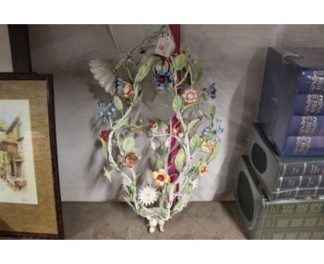 A metal flower form ceiling light fitting