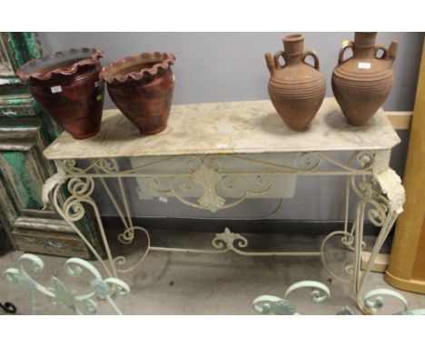 A metal console table with cream base and variegated marble top, measuring 90cm tall, 132cm long, and 41cm deep (282)