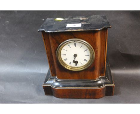 A mahogany cased single train mantle clock with pendulum