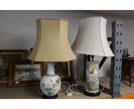 Two oriental polychrome table lamps on wooden bases and an elephant table lamp