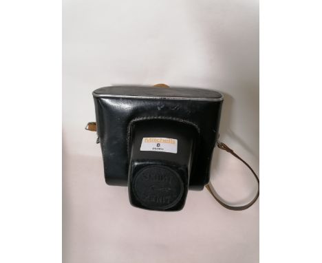 A cased vintage Zenit-E SLR camera 