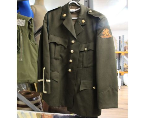 A vintage KL 1980's Netherlands army military jacket with metal buttons 