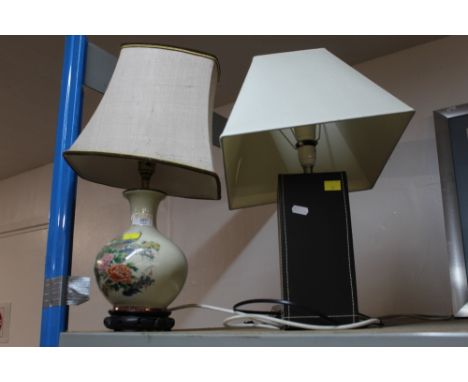 A leatherette table lamp together with an oriental table lamp