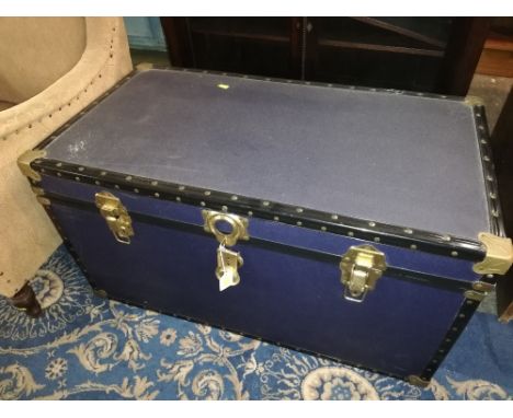 A vintage blue studded trunk with metal fittings, measuring 50cm tall, 92cm wide, and 50cm deep