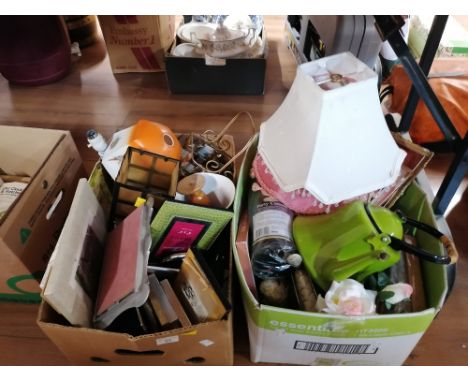 2 boxes of photo frames, light shades, party cannon and other items