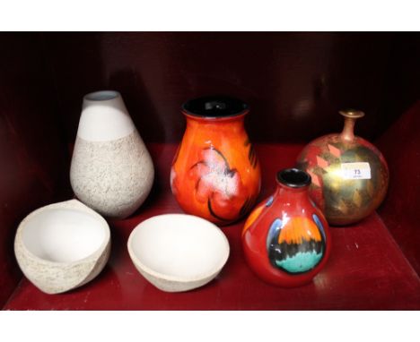 Three pieces of Jean Jenkins signed pottery, two Poole vases, and a lustre vase 