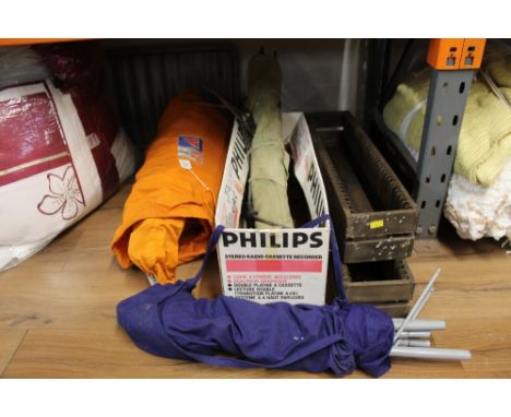 A vintage Force 10 tent in a bag together with poles and wooden tray
