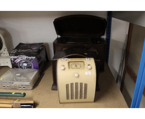 A cream coloured vintage Ever Ready radio and two other vintage radios 