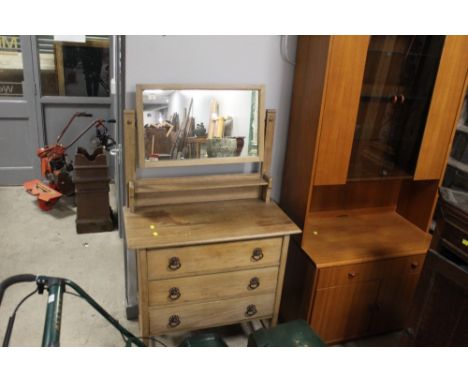 A light oak dressing chest with three drawers and rectangular mirror, measuring 146cm tall, 84cm wide, and 43cm deep