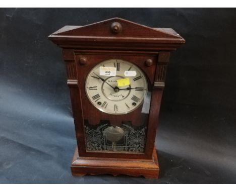 A mahogany cased pendulum mantle clock by Jeffery of Plymouth