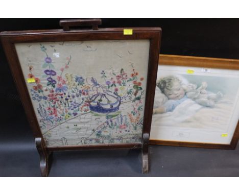 A "Happy Dreams" print together with needlework  fire screen