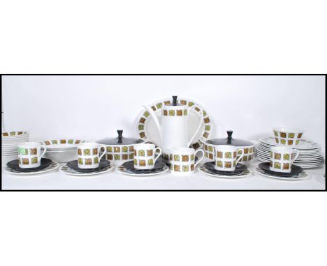 A retro 20th Century ceramic Myott coffee and dessert service in the Aztec pattern comprising of coffee pot.cups and saucers,