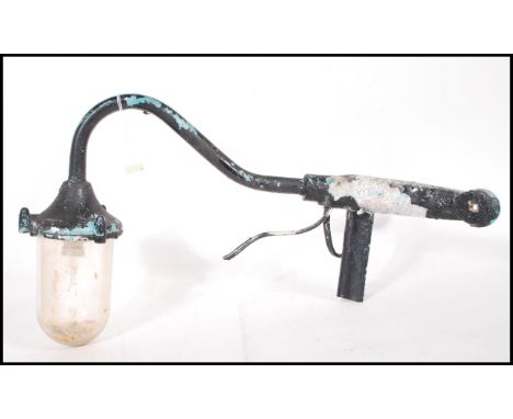 A vintage mid 20th Century&nbsp;industrial dairy lamp complete with glass drop shade with painted metal wall bracket. Measure