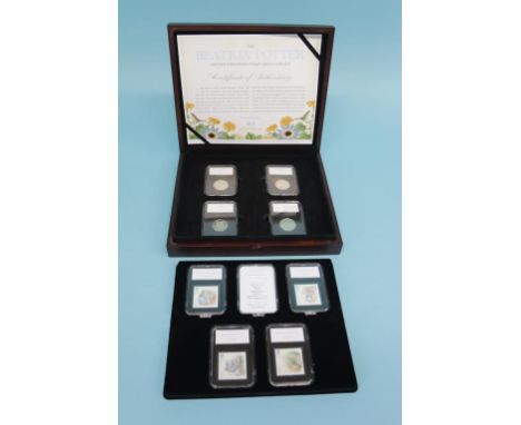 A boxed 'The Beatrix Potter UK Stamp and Coin Set', limited edition 53/495, (cupro-nickel) and a Collection of First Day Cove