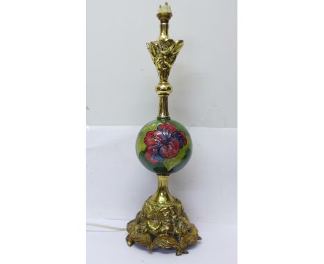 A Moorcroft hibiscus table lamp base, 40cm, (gilt resin base cracked, under the 'globe') 