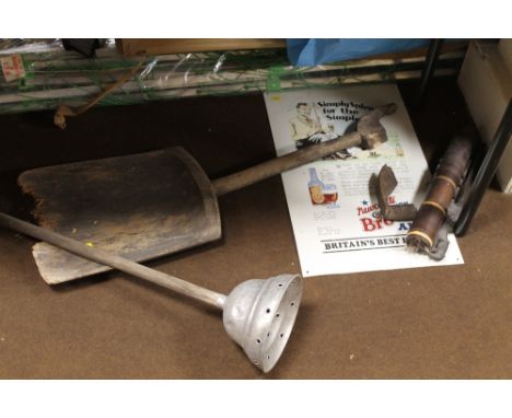 A VINTAGE WOODEN SHOVEL, PLUNGER, SIGN, ETC 