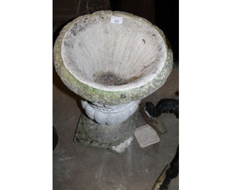 A STONE GARDEN PLANTER 