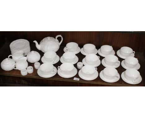 A QUANTITY OF WEDGWOOD 'COUNTRYWARE' INCLUDING TEAPOT, JUGS, SUGAR BOWLS, CUPS & SAUCERS (14), TEA PLATES (10) AND NAPKIN RIN