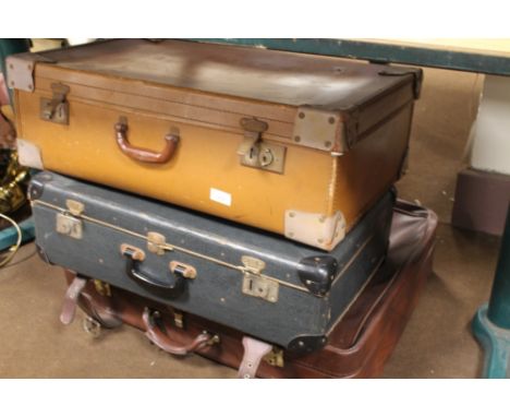 THREE VINTAGE SUITCASES 