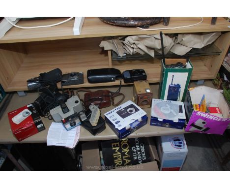 Quantity of various items including box Brownie camera, multi band radio, Polaroid camera etc