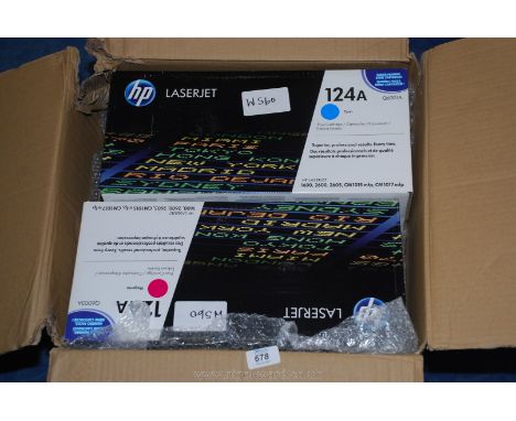 Box of HP124A laser print cartridges yellow black magenta cyan.
