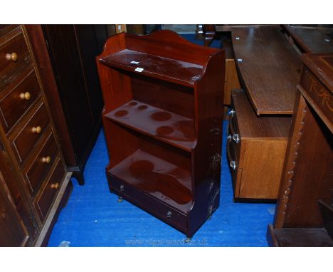 Modern three shelf bookcase with drawer to base.