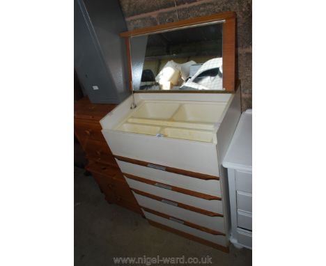 Four drawer chest of drawers with integrated makeup shelf and mirror