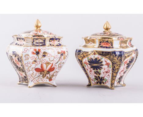 A Royal Crown Derby bone china bomb shape covered jar, 1913, Old Imari pattern, No. 1128, 10cm and another of the same shape,