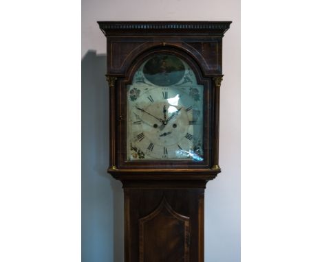 A George III mahogany longcase clock, arched painted dial with subsidiary second dial and date dial, floral spandrels, the lu