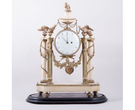 A Louis XVI style gilt metal and alabaster mantel clock, mid 19th Century, with a flame filled urn finial, with a drum flanke