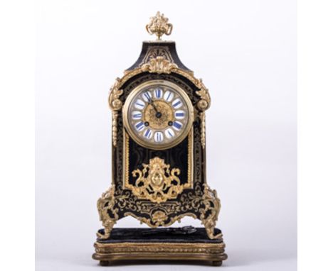 A French Boulle work and ebonised mantel clock, probably late 19th Century, cast gilt metal appliqués, enamel numerals, Frenc