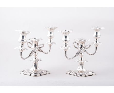 A pair of three light silver table candelabra, by Viner's Limited, Sheffield 1959-69, squat form, broad knopped stems, shaped