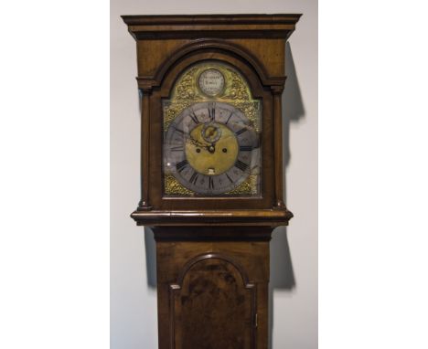 Walnut longcase clock, hood with moulded and cavetto cornice, three quarter turned columns, long door, crossbanding and mould