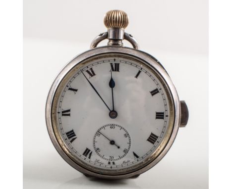 A silver open face repeating pocket watch, the white enamel dial having a roman numeral chapter ring and small seconds dial, 