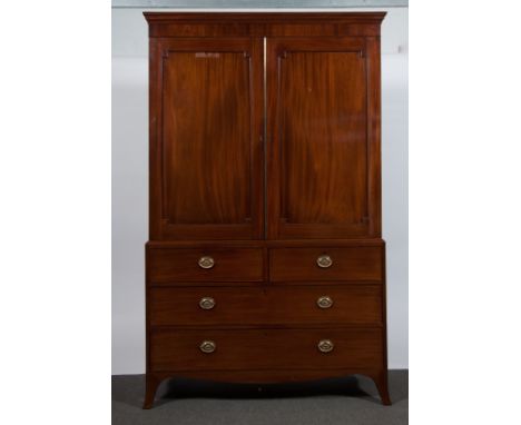 A George IV mahogany press cupboard, moulded cornice, plain frieze, two panel doors to the upper section enclosing five slide