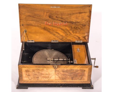 "The Imperial", A walnut cased polyphon, playing 30cm discs, part ebonised interior, case with kingwood banding and stringing