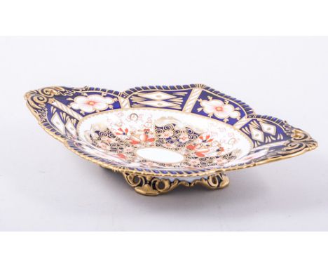 A Royal Crown Derby bone china lozenge shape dish, 1912, Imari pattern, quadrefoil outline, pierced scroll handles, No. 2451,