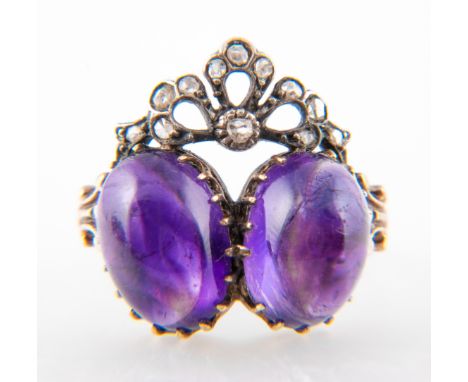 A Victorian amethyst and rose cut diamond ring, a pair of oval cabochon cut amethyst 11.5mm x 8mm, claw set side by side with