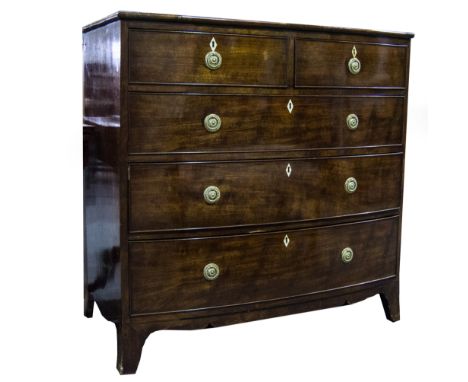 A George IV mahogany bow-front chest of drawers
fitted with two short and three long drawers, splayed bracket feet
width 107c